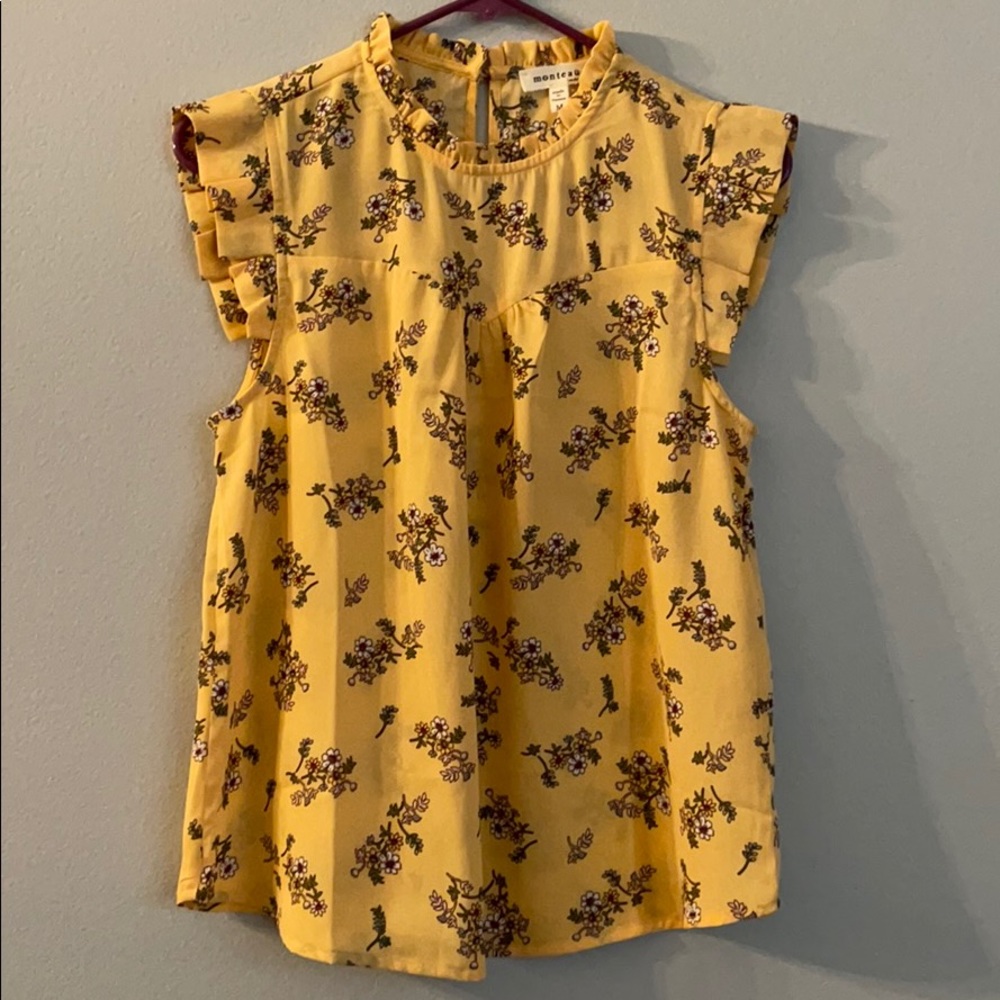 Floral print sleeveless blouse